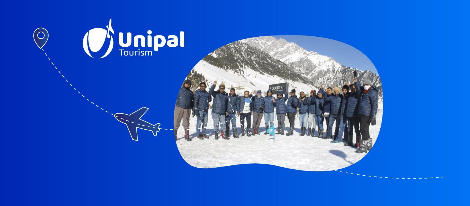A Unipal Tourism group gathered in the snowy mountains of Kashmir