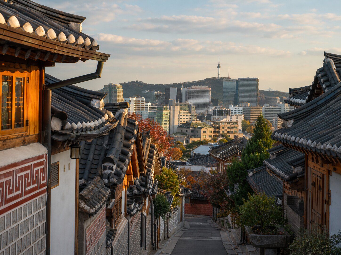 Traditional Seoul rooftops leading toward the modern skyline
